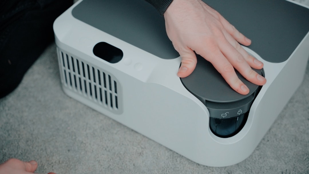 hand-pressing-button-on-a-white-projector-p0ijsox6fda